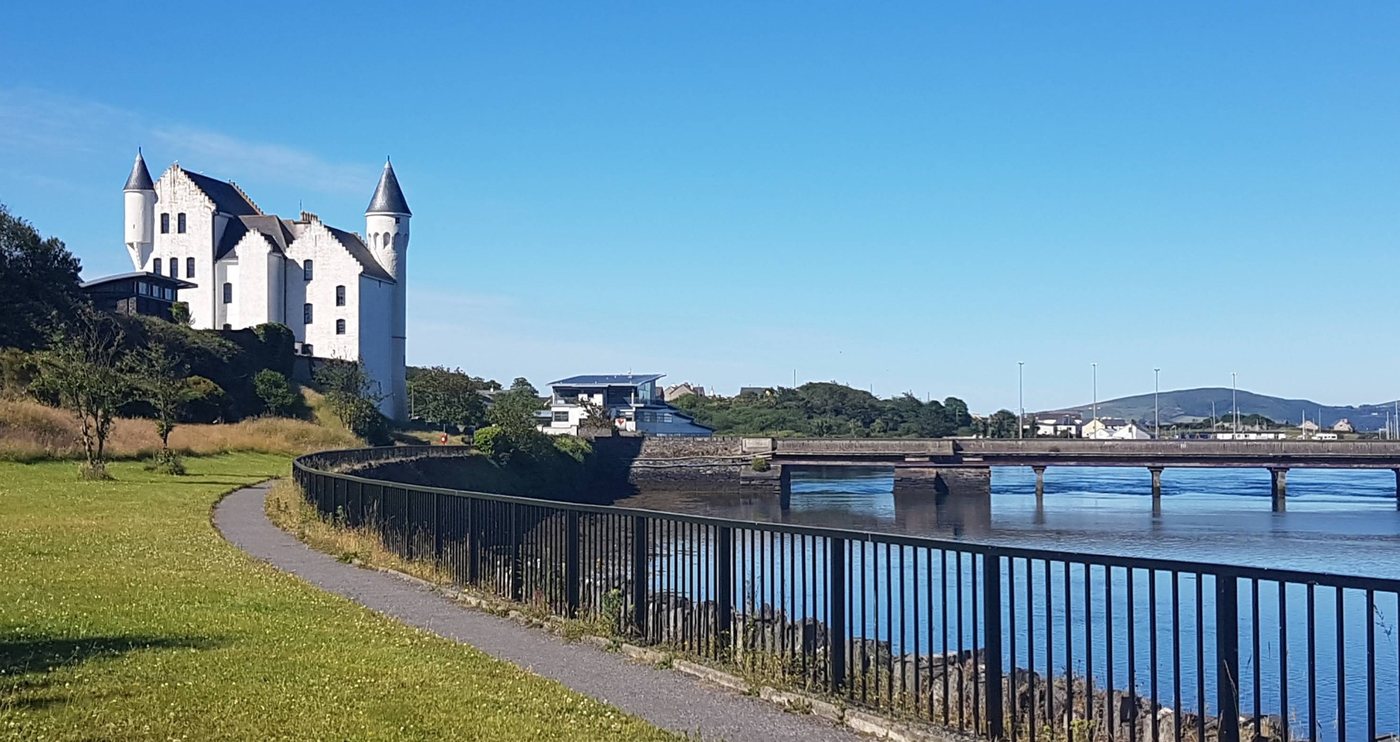 The white turreted Old Barracks above the Valentia River in Cahersiveen